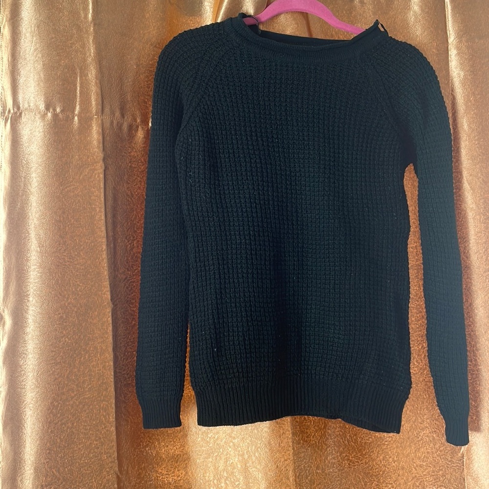 Dark green sweater